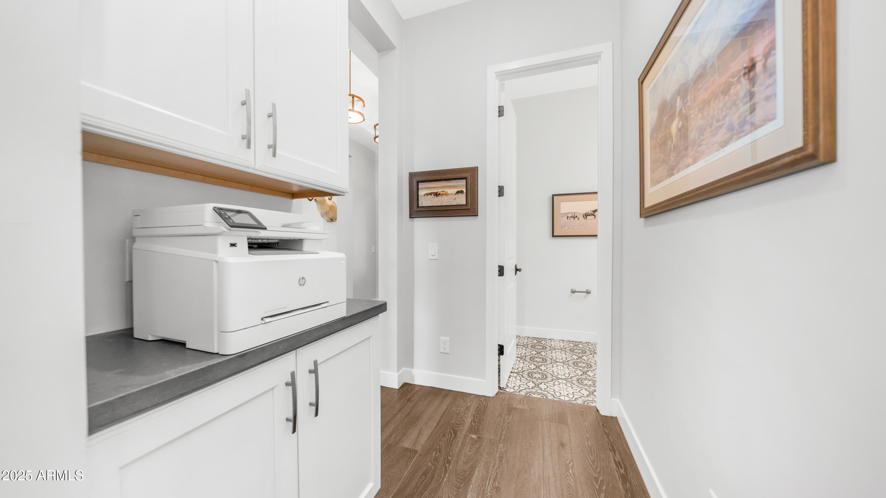 2086 East Trigger Way Gilbert, AZ 85297 - Photo 17 of 69 a view of kitchen with cabinets and wooden floor