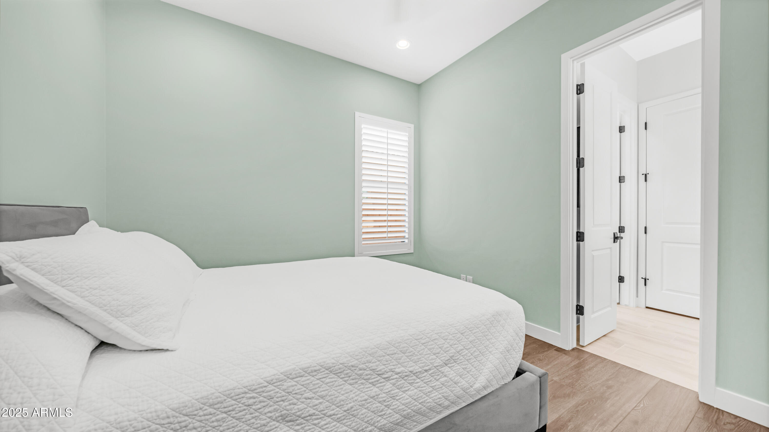 2086 East Trigger Way Gilbert, AZ 85297 - Photo 22 of 69 a bedroom with a bed and a window