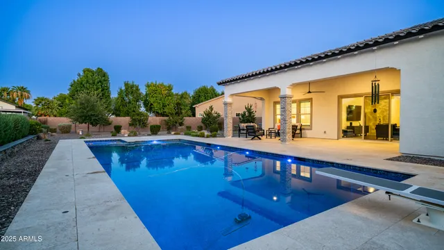 a kitchen with a stove a sink and a refrigerator