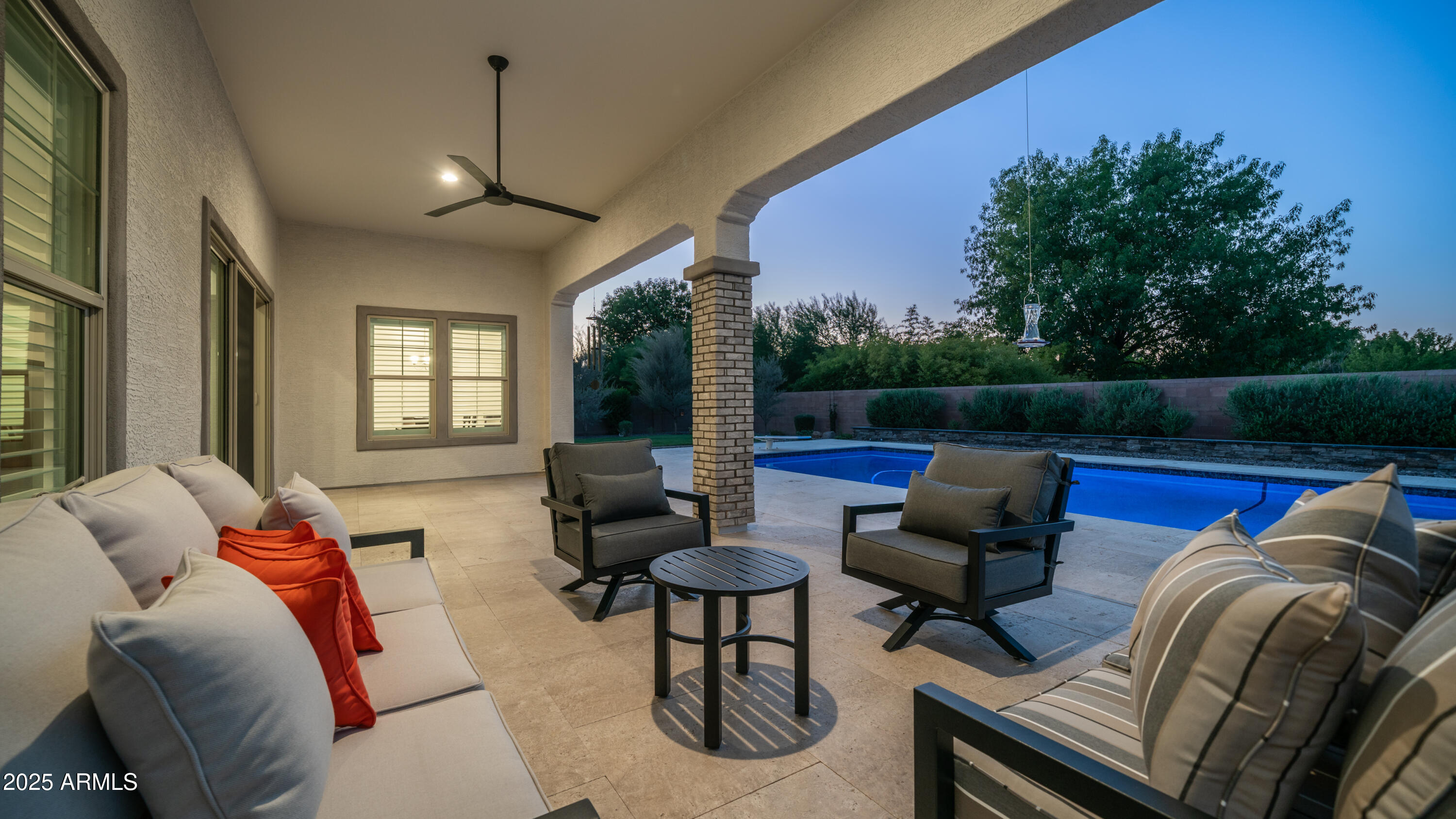 2086 East Trigger Way Gilbert, AZ 85297 - Photo 28 of 69 a living room with furniture a rug and a large window