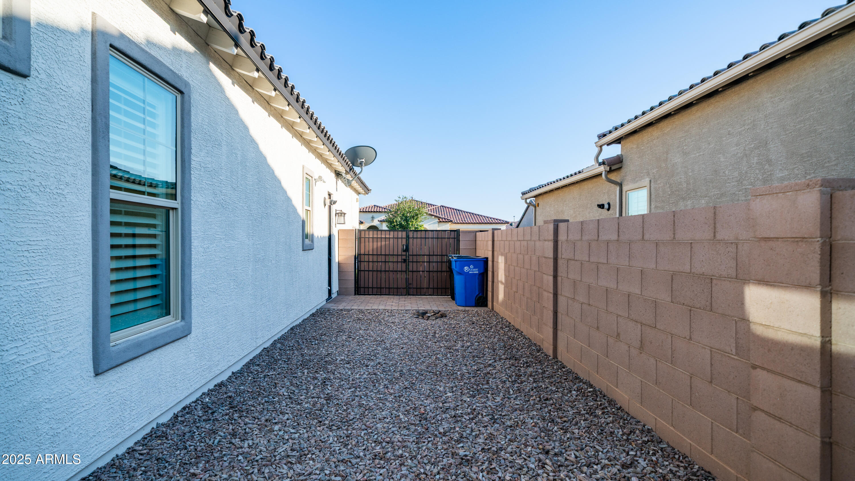 2086 East Trigger Way Gilbert, AZ 85297 - Photo 33 of 69 Gravel sideyard with double gate