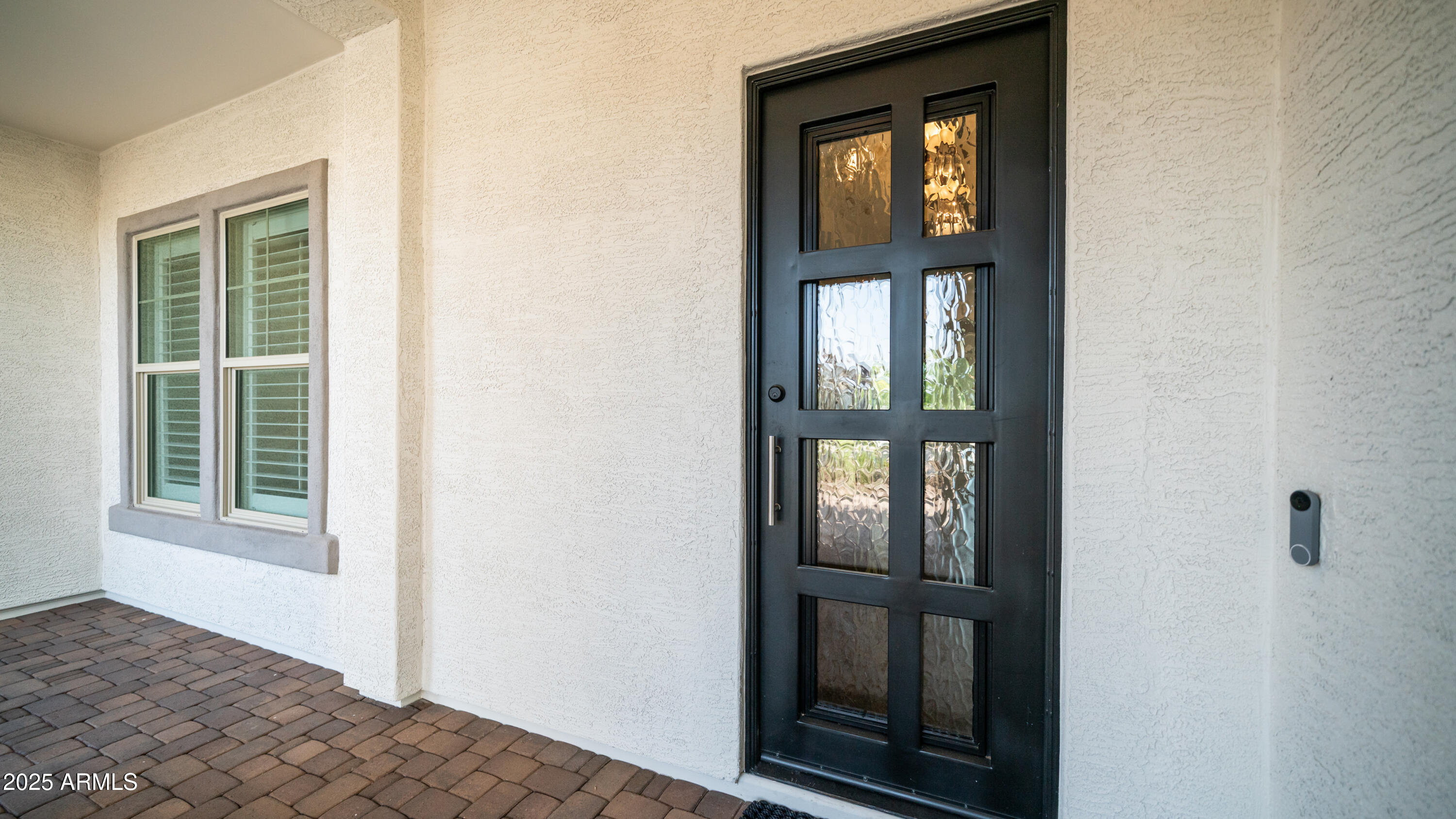 2086 East Trigger Way Gilbert, AZ 85297 - Photo 34 of 69 a view of an empty room with wooden floor and a window