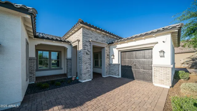 a swimming pool with patio outdoor seating and yard