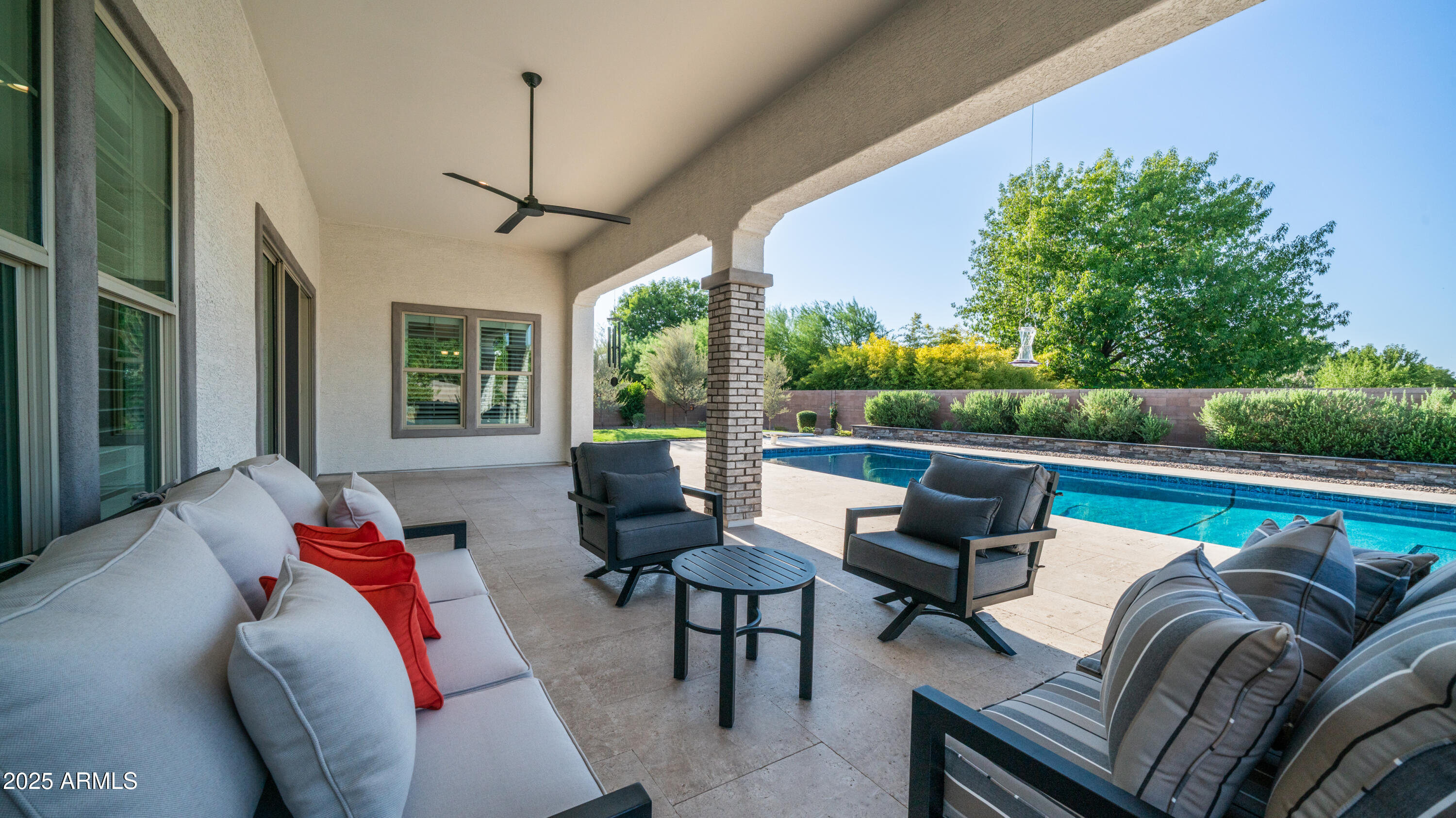 2086 East Trigger Way Gilbert, AZ 85297 - Photo 4 of 69 a balcony with furniture and a potted plant