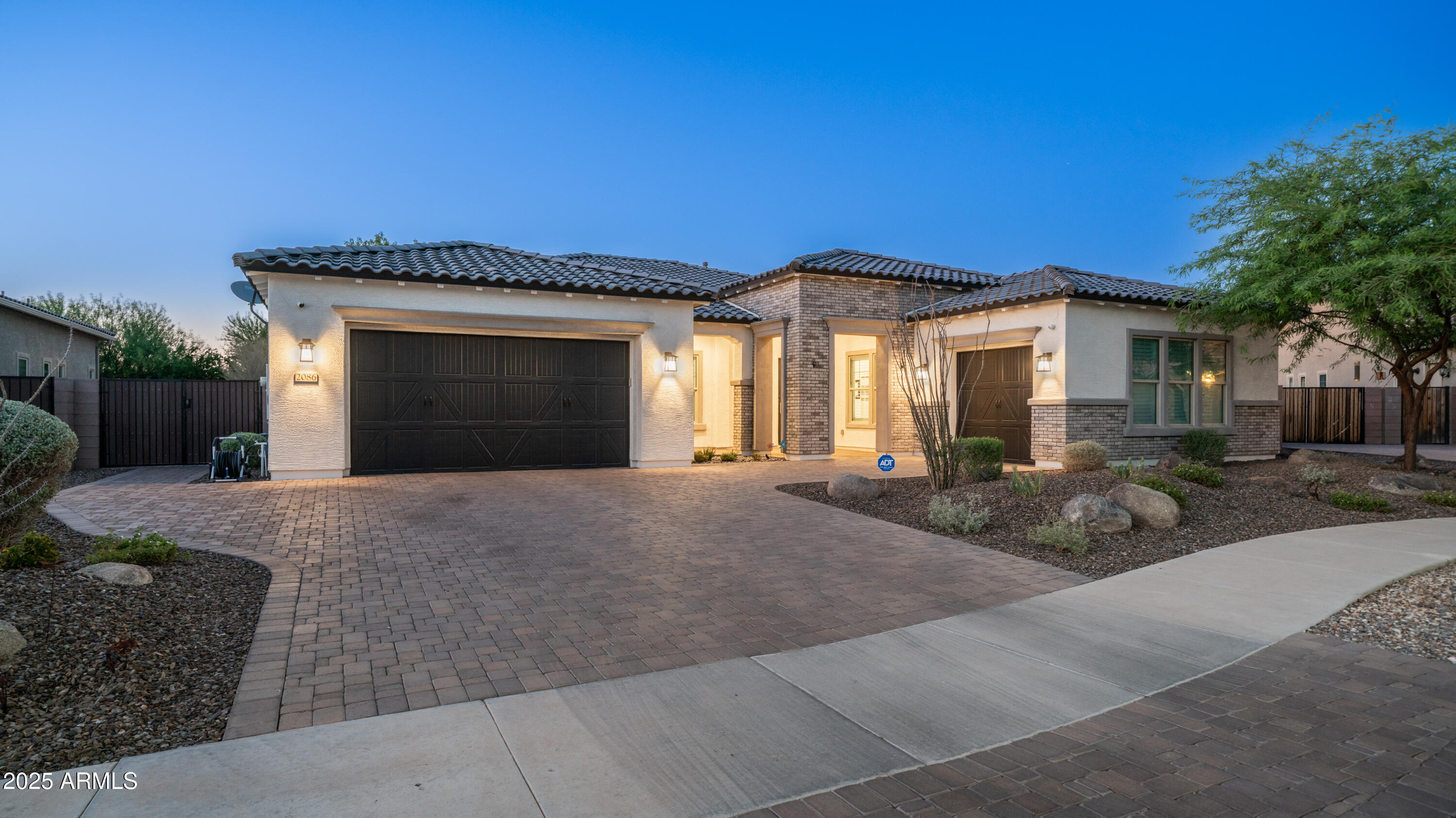 2086 East Trigger Way Gilbert, AZ 85297 - Photo 54 of 69 a front view of a house with yard