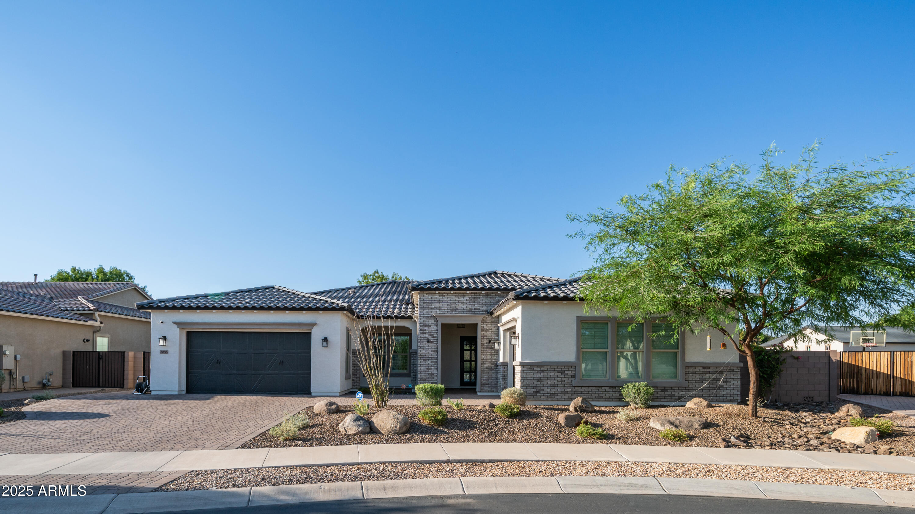 2086 East Trigger Way Gilbert, AZ 85297 - Photo 56 of 69 a front view of a house with yard