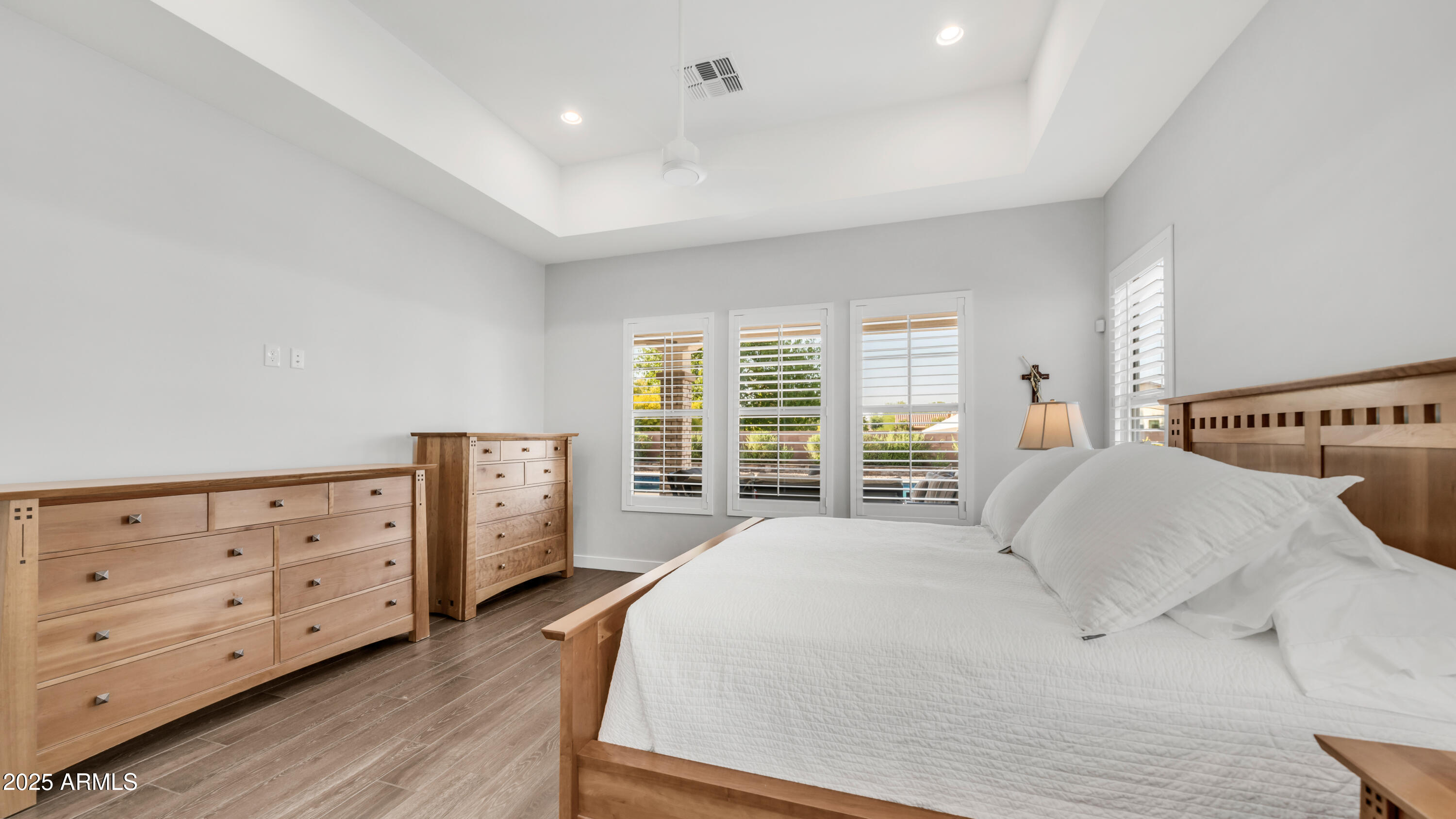 2086 East Trigger Way Gilbert, AZ 85297 - Photo 9 of 69 a spacious bedroom with a bed and a dresser