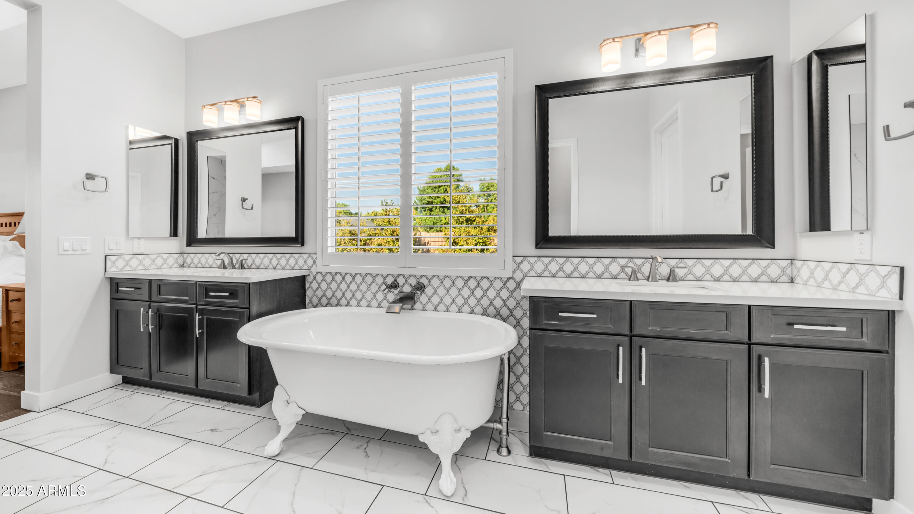 2086 East Trigger Way Gilbert, AZ 85297 - Photo 10 of 69 a bathroom with a sink and a mirror