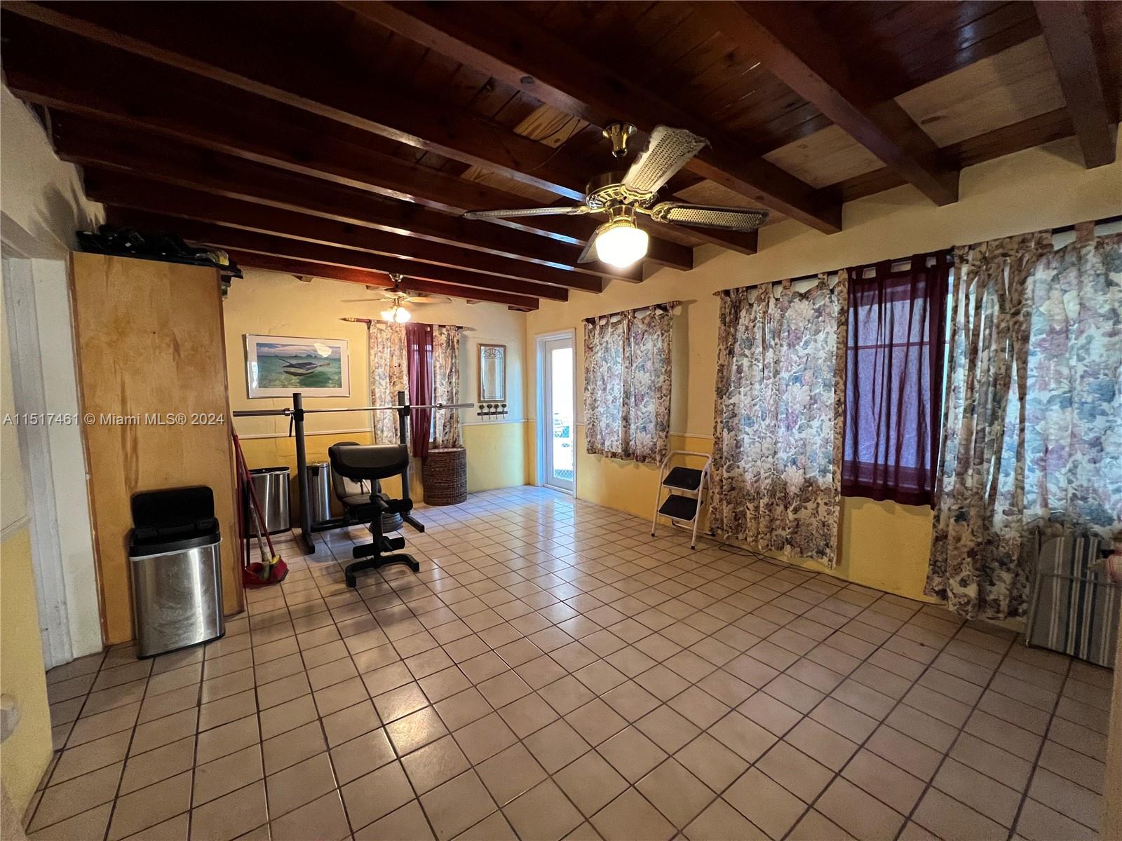 2675 Southwest 24th Terrace Miami, FL 33145 - Photo 11 of 17 a view of a room with gym equipment
