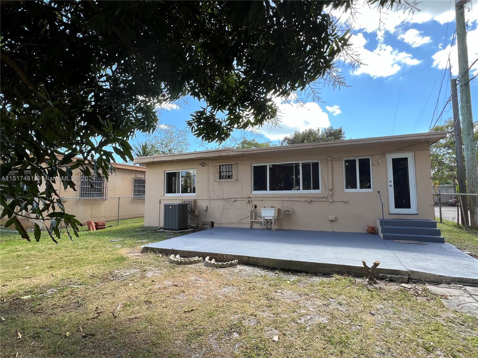 2675 Southwest 24th Terrace Miami, FL 33145 - Photo 16 of 17 a view of a house with a backyard