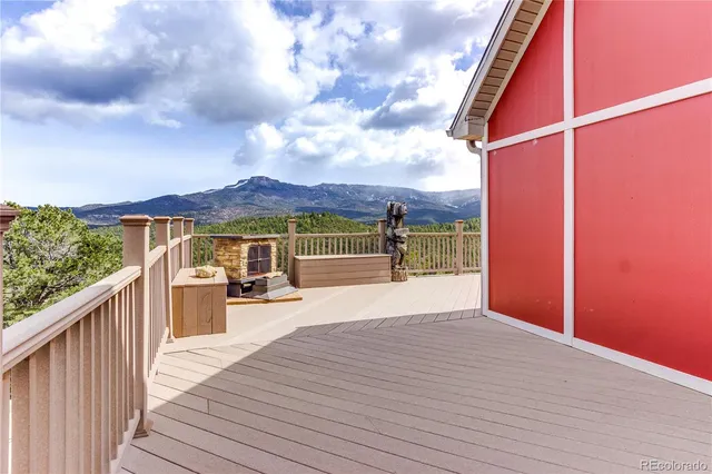 a view of a balcony with lake view and mountain view