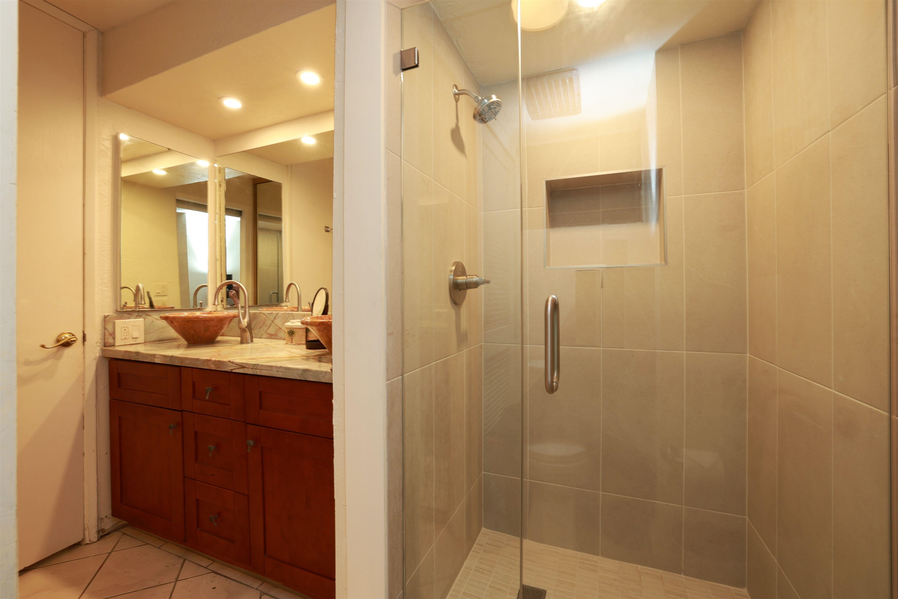 3543 Lower Honoapiilani Road, Unit C107 Lahaina, HI 96761 - Photo 11 of 49 a bathroom with a shower sink and mirror