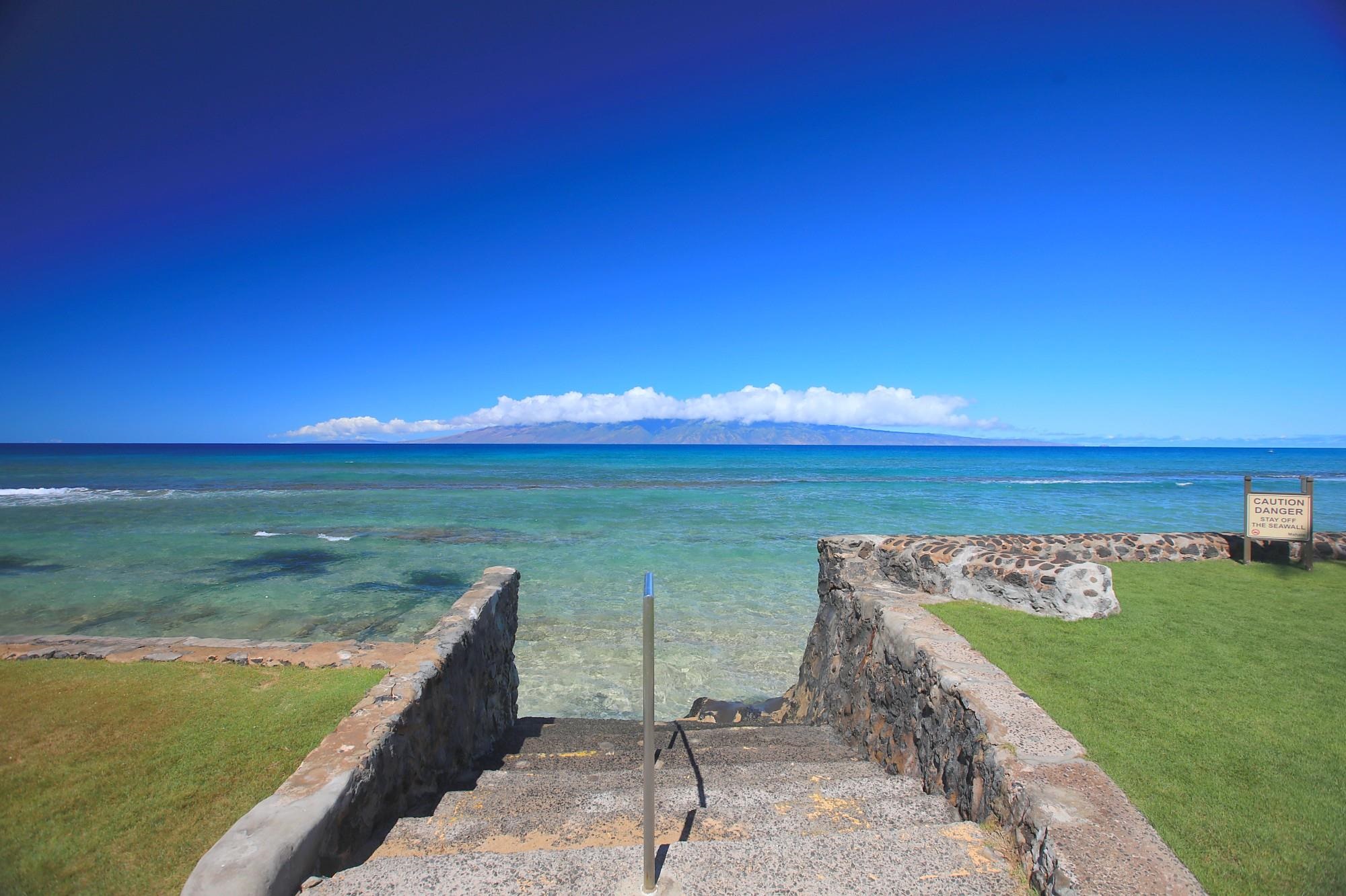 3543 Lower Honoapiilani Road, Unit C107 Lahaina, HI 96761 - Photo 27 of 49 a view of a lake with a big yard