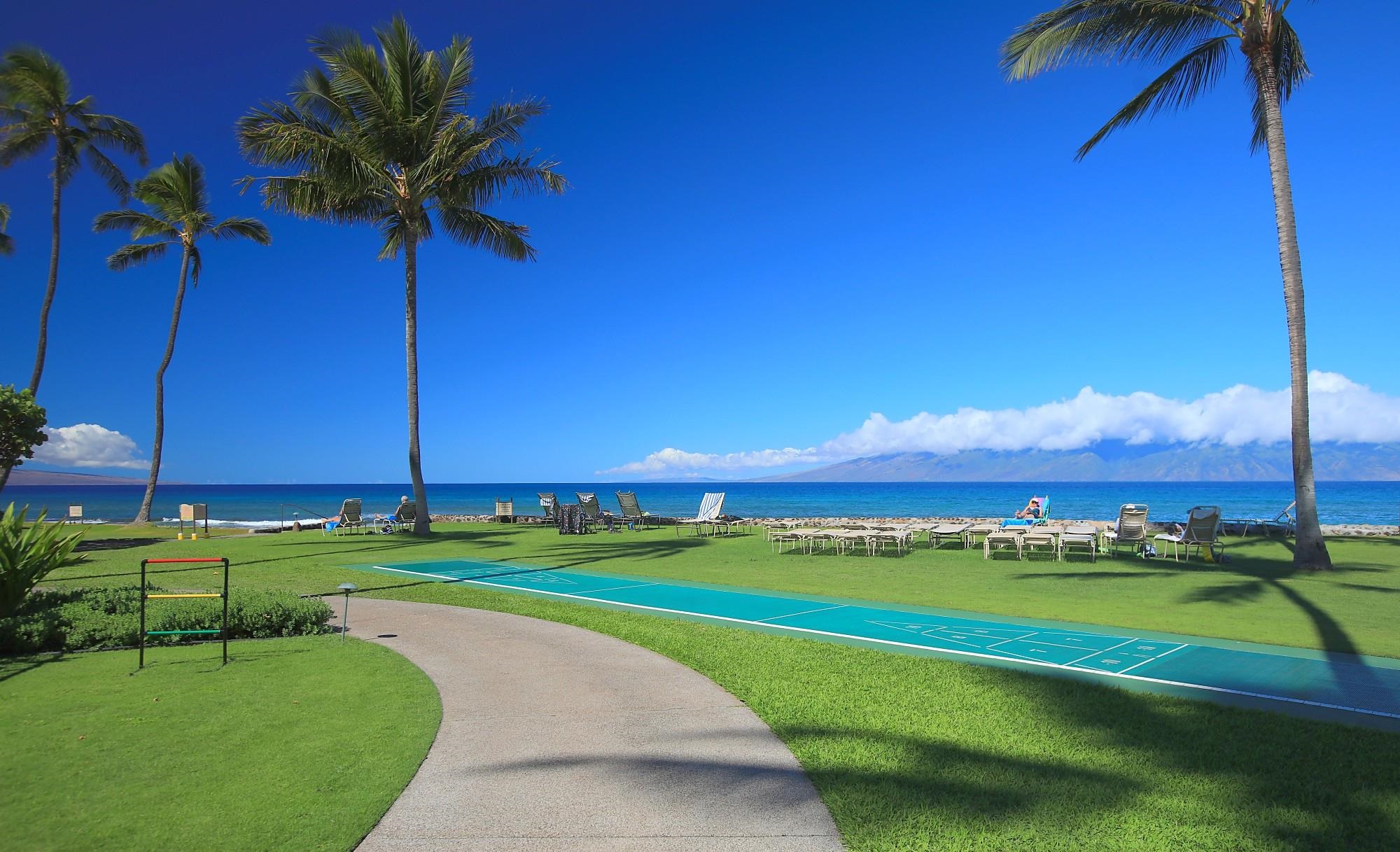 3543 Lower Honoapiilani Road, Unit C107 Lahaina, HI 96761 - Photo 40 of 49 a view of a golf course with a lake
