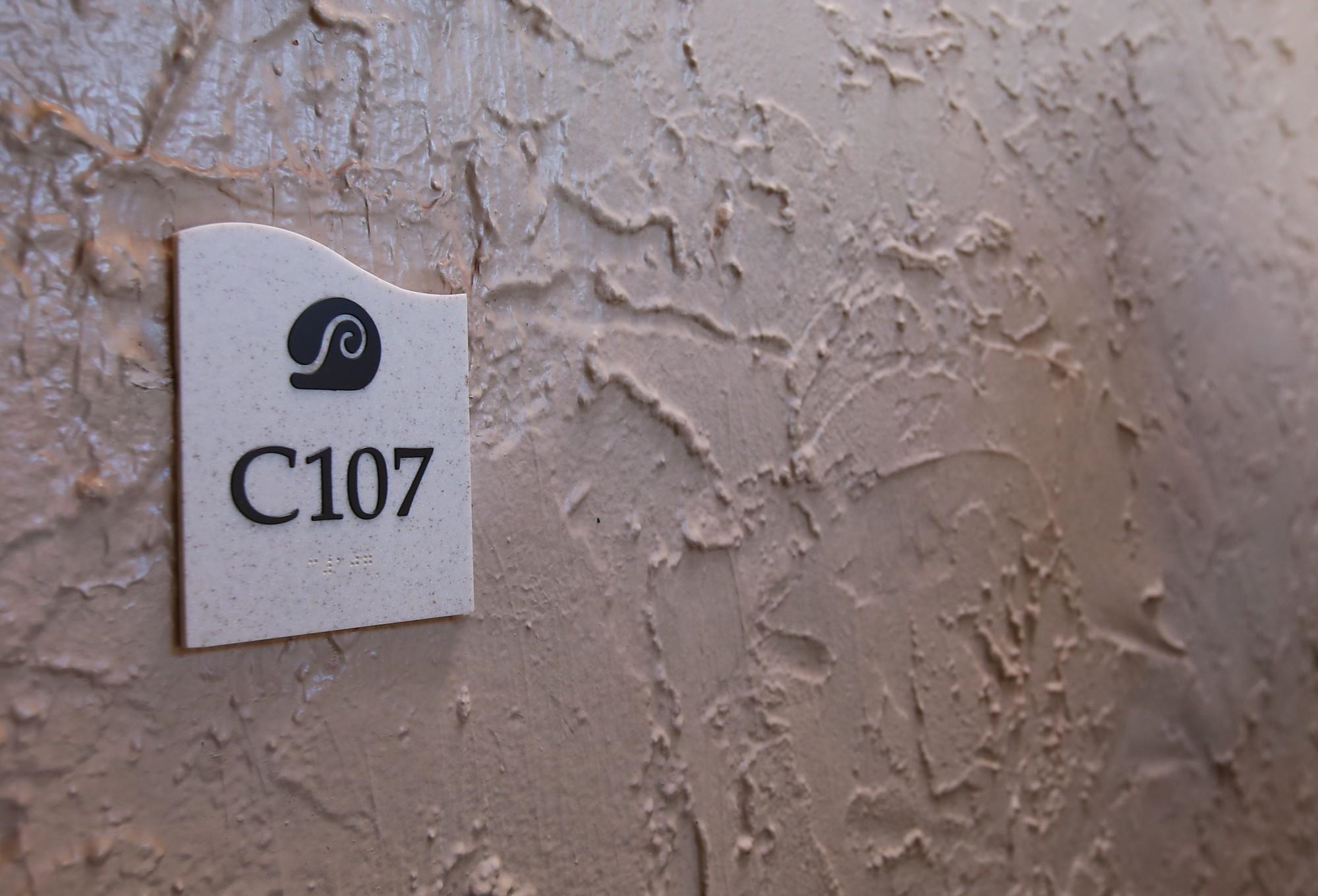 3543 Lower Honoapiilani Road, Unit C107 Lahaina, HI 96761 - Photo 49 of 49 a view of a wooden wall under a large tree