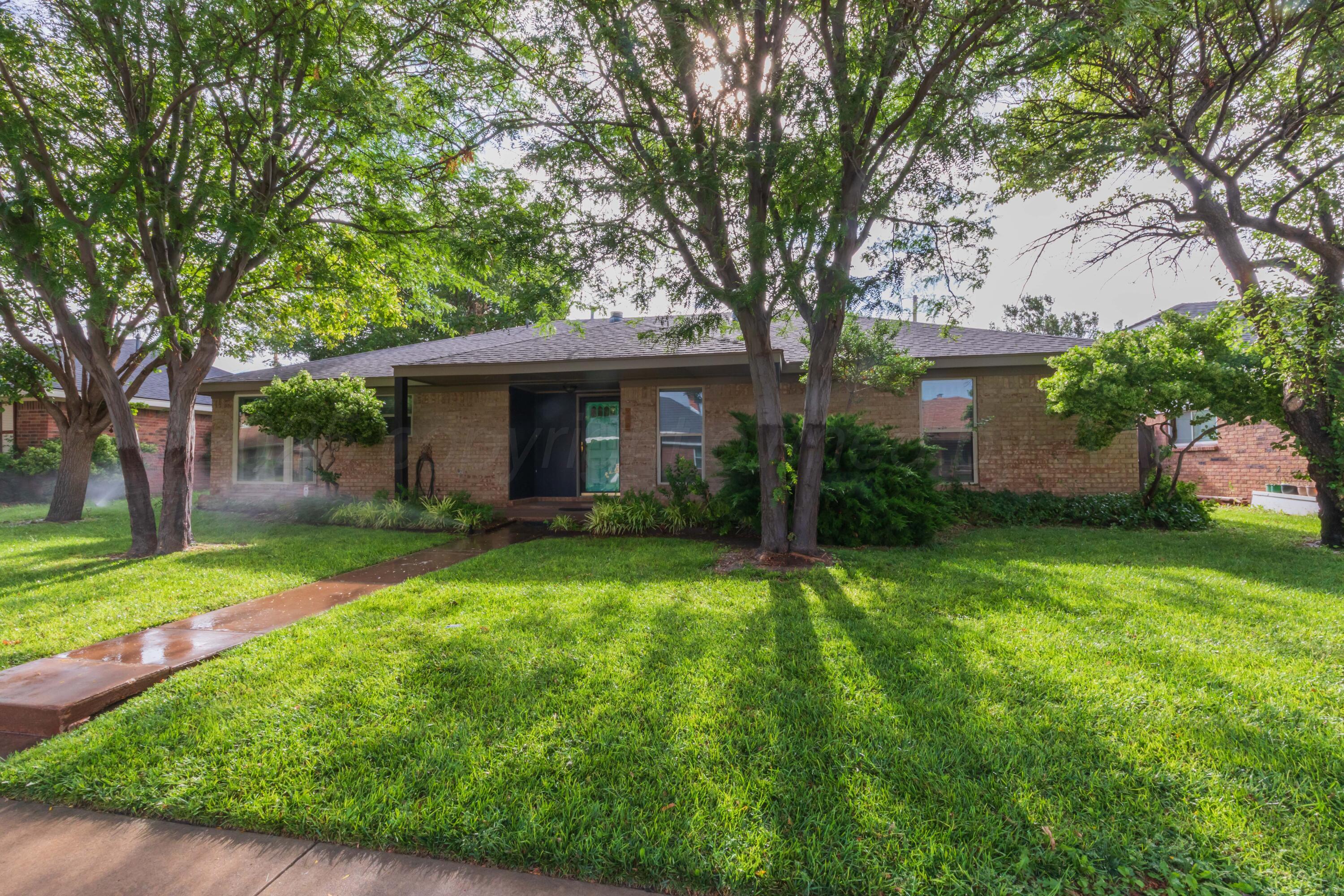 1031 Cimarron Trail Canyon, TX 79015 - Photo 1 of 50 front view of a house with a yard