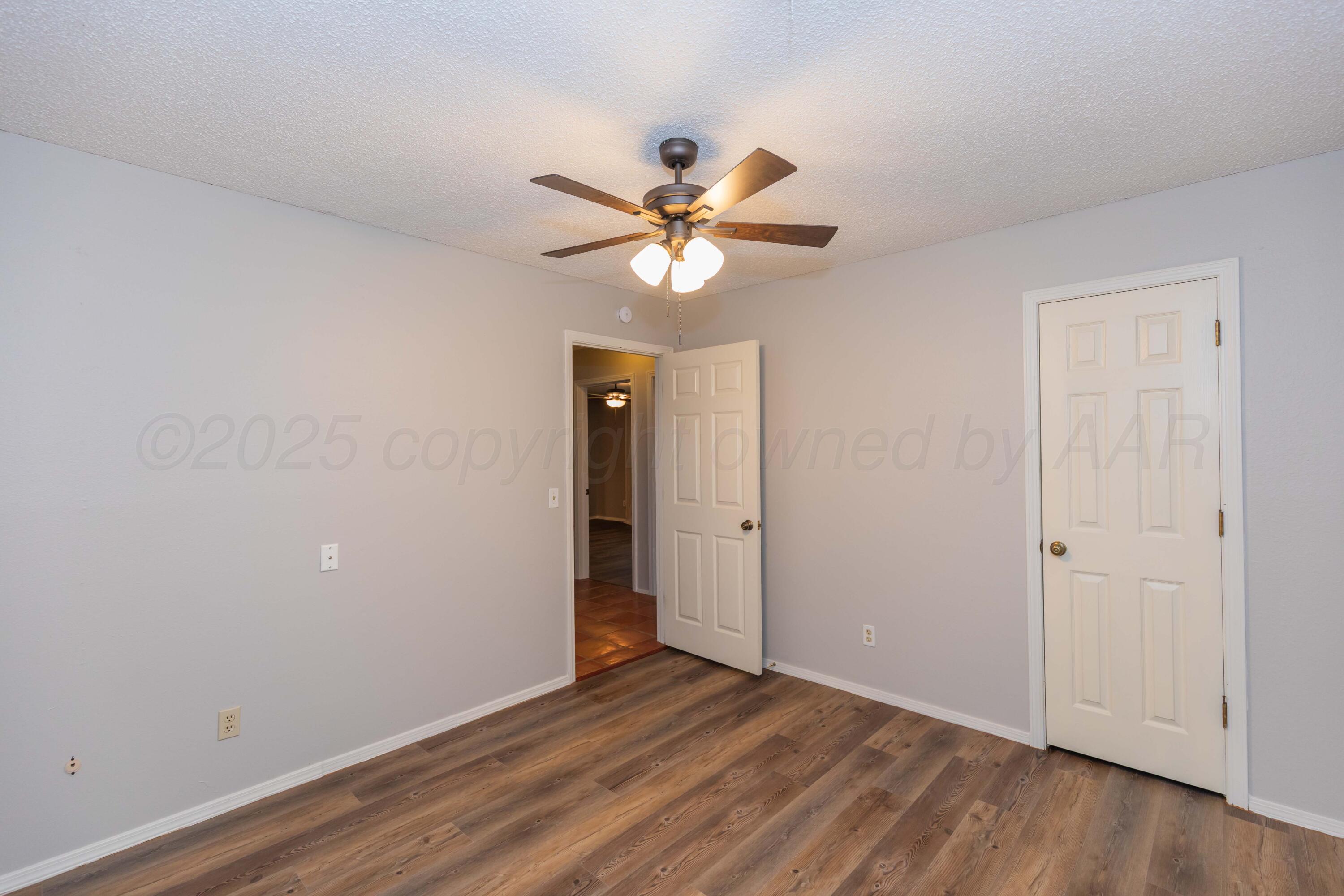 1031 Cimarron Trail Canyon, TX 79015 - Photo 34 of 50 a view of a room with a ceiling fan and a fan