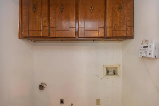 a view of door with washer and dryer