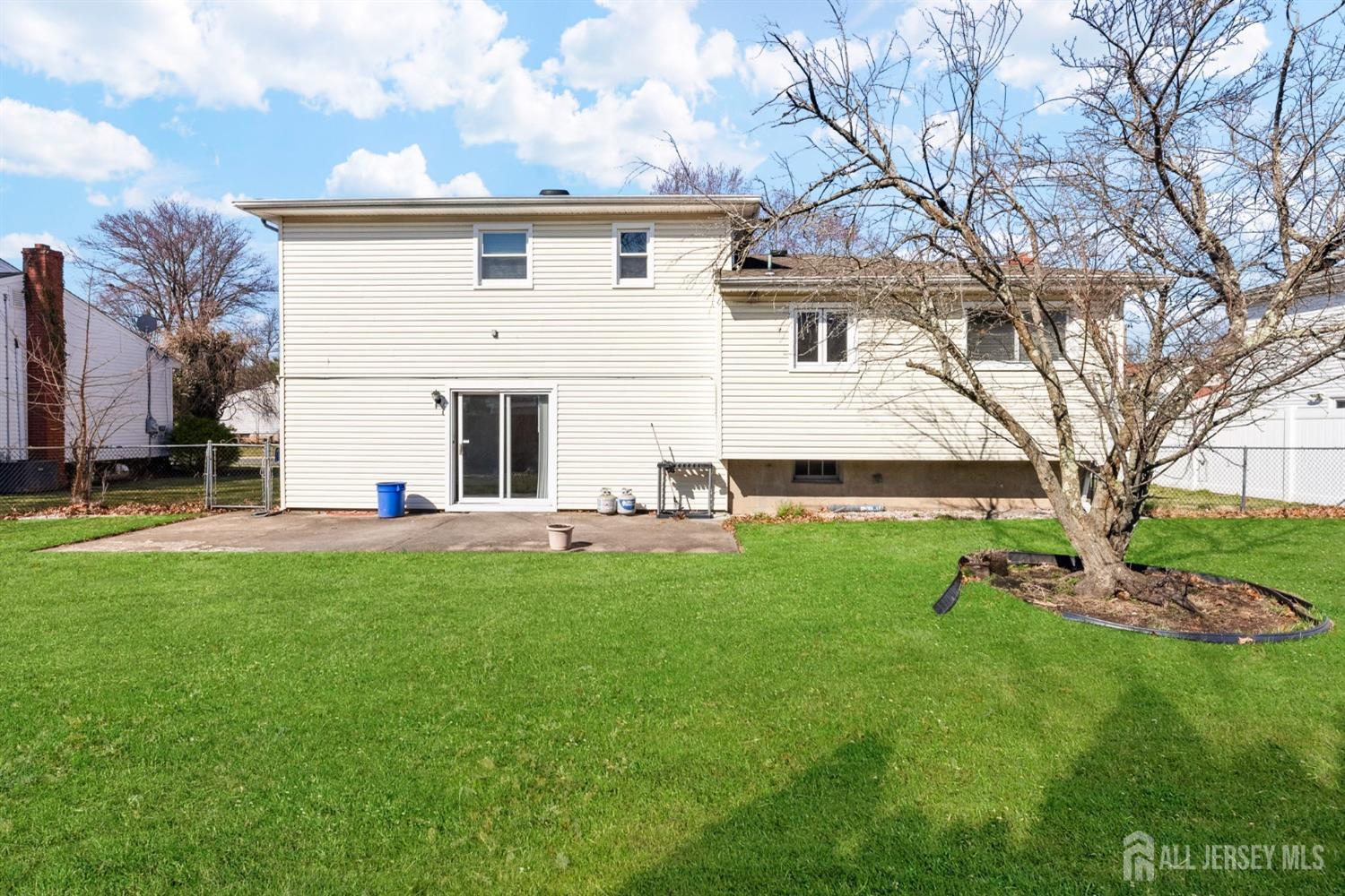 24 Lench Avenue Edison, NJ 08820 - Photo 33 of 38 a view of a house with a backyard