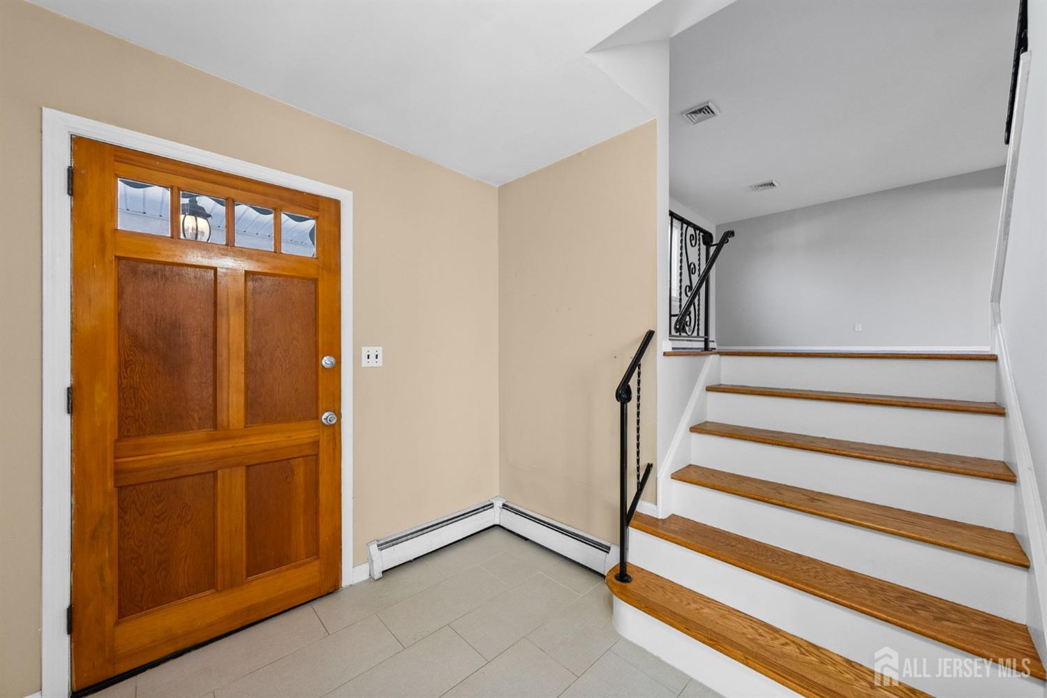 24 Lench Avenue Edison, NJ 08820 - Photo 7 of 38 a view of entryway with stairs