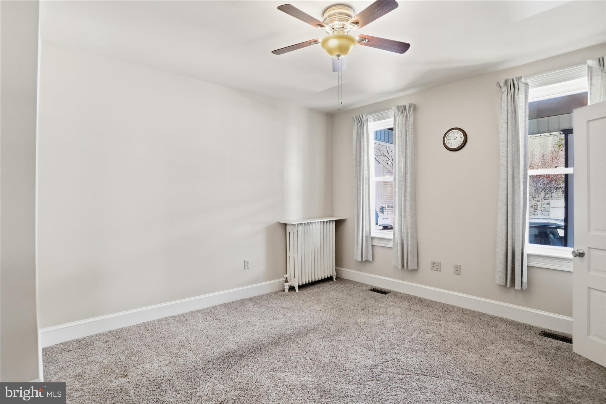 438 Chestnut Street Cumberland, MD 21502 - Photo 24 of 36 an empty room with closet and windows