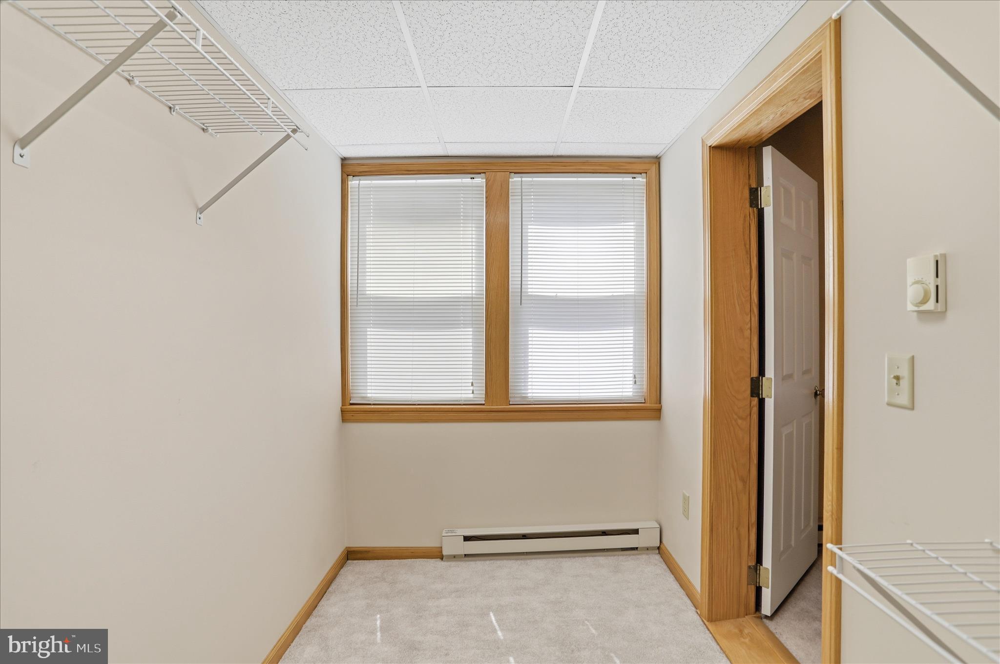 438 Chestnut Street Cumberland, MD 21502 - Photo 9 of 36 a view of an empty room with a window