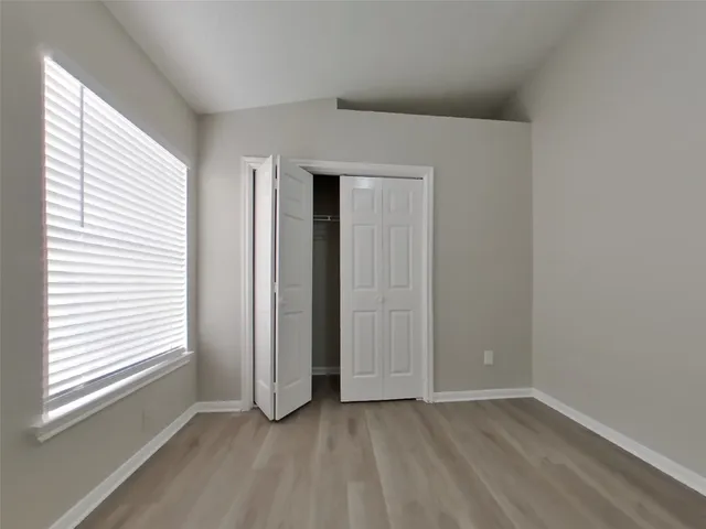 an empty room with window