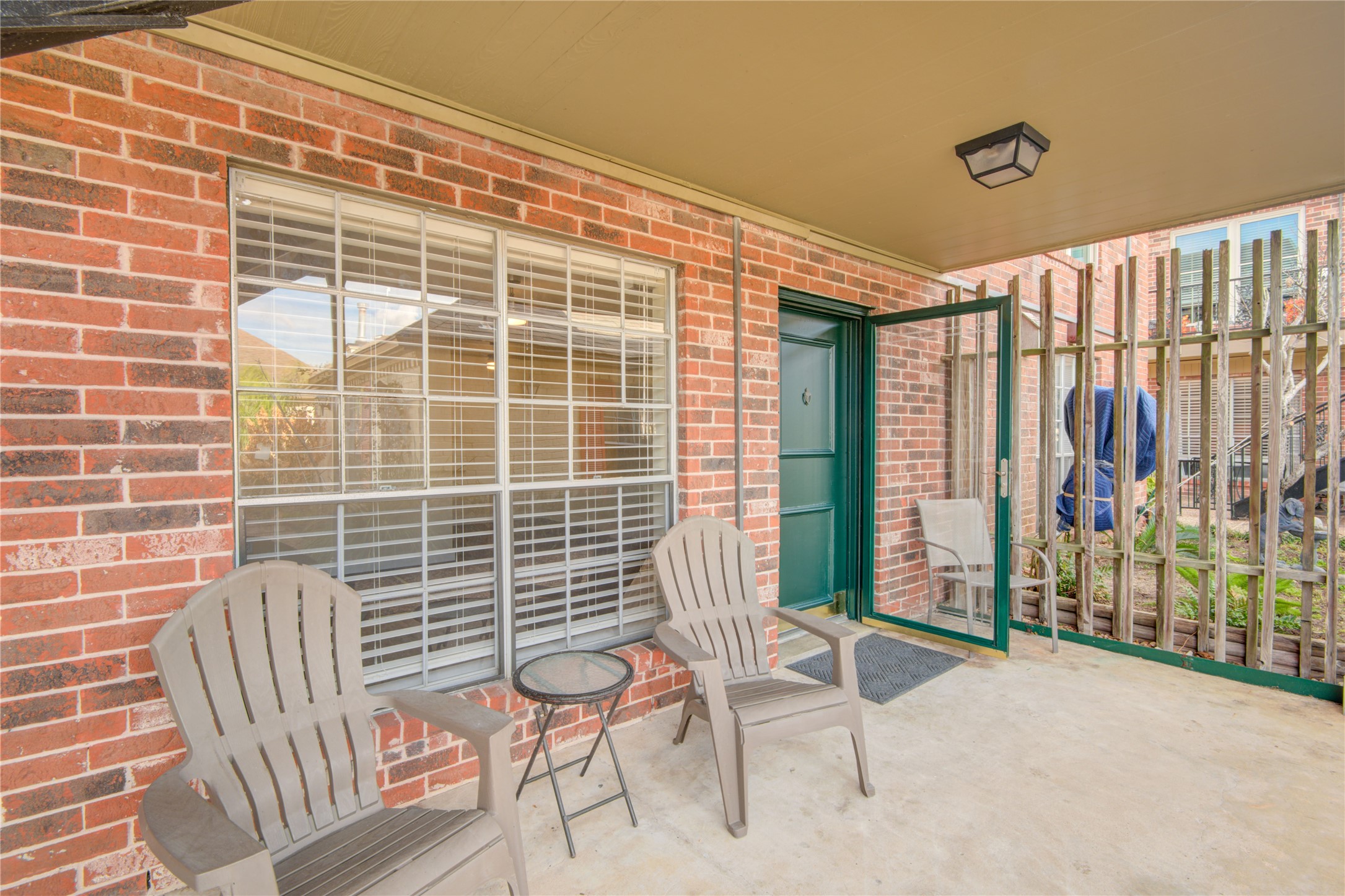 11540 Chimney Rock Road, Unit 117 Houston, TX 77035 - Photo 5 of 38 a view of a balcony with chairs