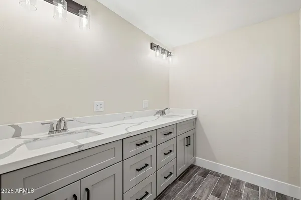 a white toilet sitting next to a bath tub