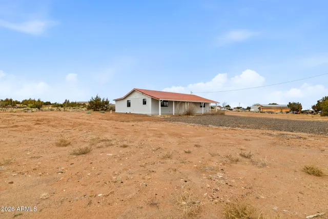 a bathroom with a sink and a lake view