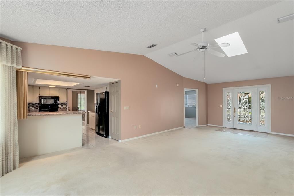 8156 Southwest 108th Ln Road Ocala, FL 34481 - Photo 7 of 50 a view of livingroom with furniture and window