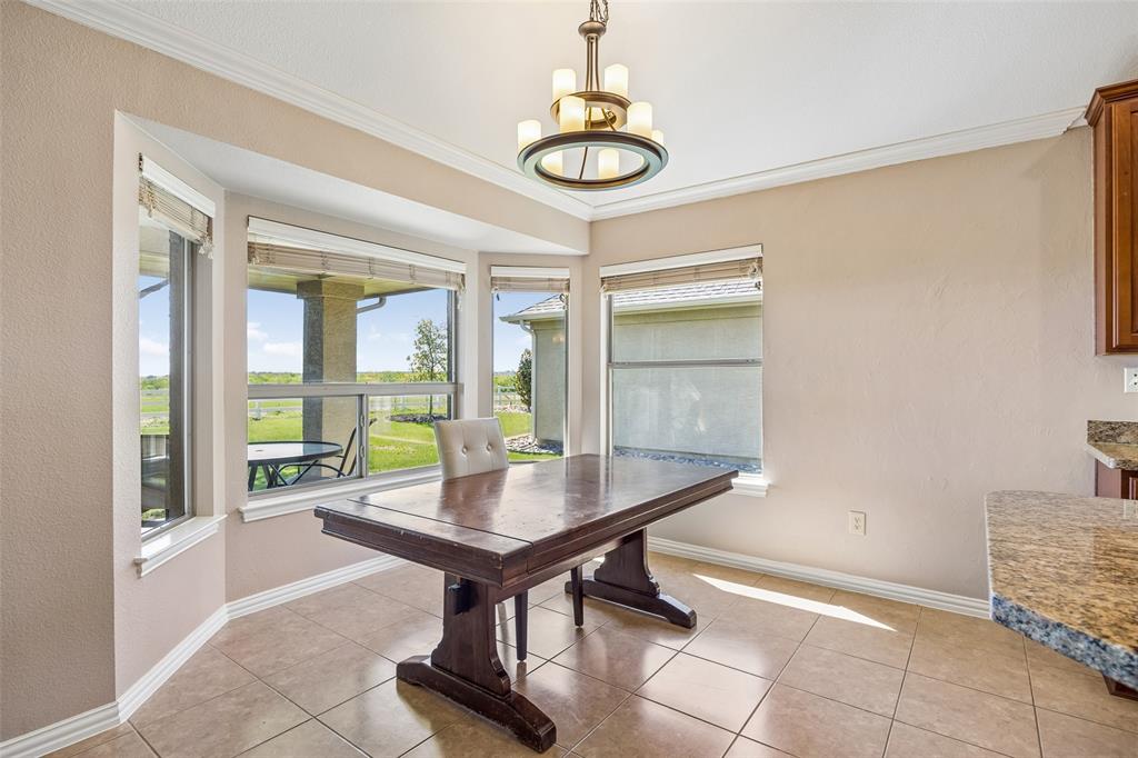 9221 Perimeter Street Denton, TX 76207 - Photo 13 of 36 a room with pool table and windows