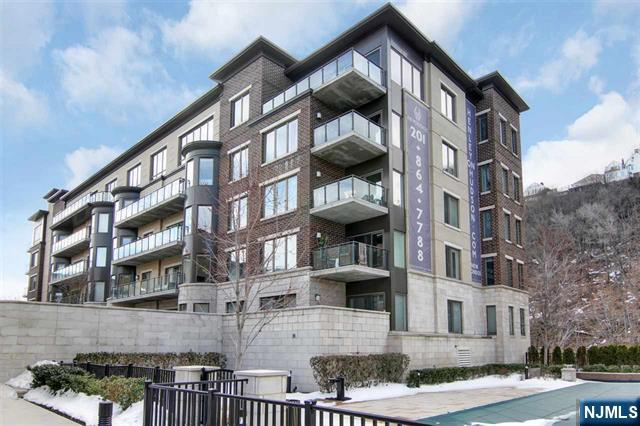 55 Eton Row Weehawken, NJ 07086 - Photo 28 of 28 a front view of a building with glass windows