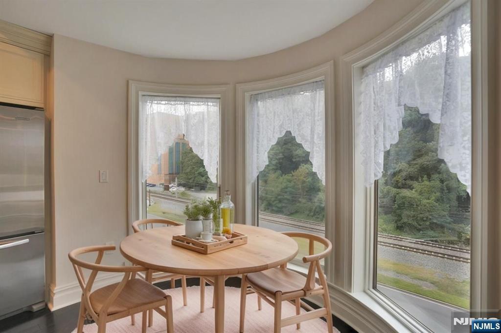 55 Eton Row Weehawken, NJ 07086 - Photo 3 of 28 a view of a dining room with furniture window and outside view
