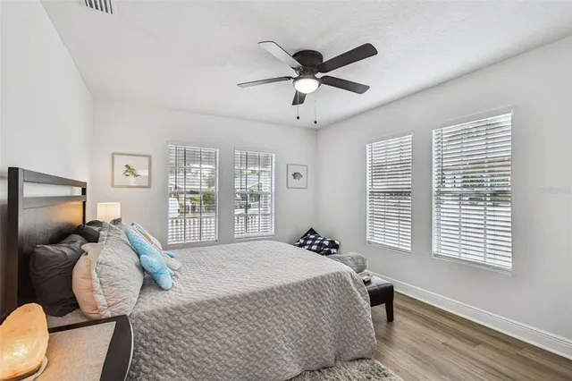 a bathroom with a sink vanity and a mirror