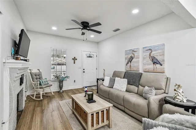 a kitchen with refrigerator and cabinets