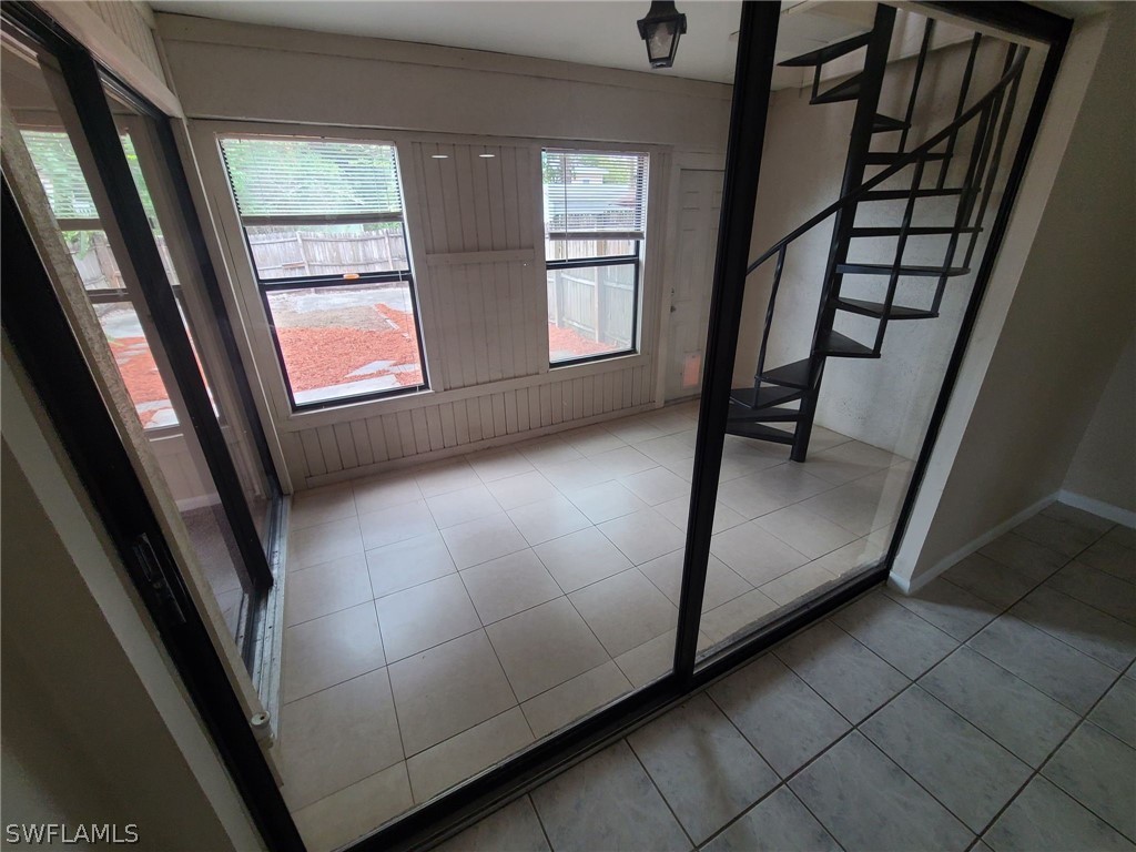 7581 Carrier Road Fort Myers, FL 33967 - Photo 4 of 14 a view of an entryway with a window