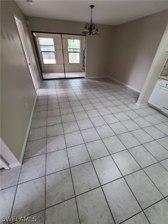 7581 Carrier Road Fort Myers, FL 33967 - Photo 7 of 14 a view of an empty room and window