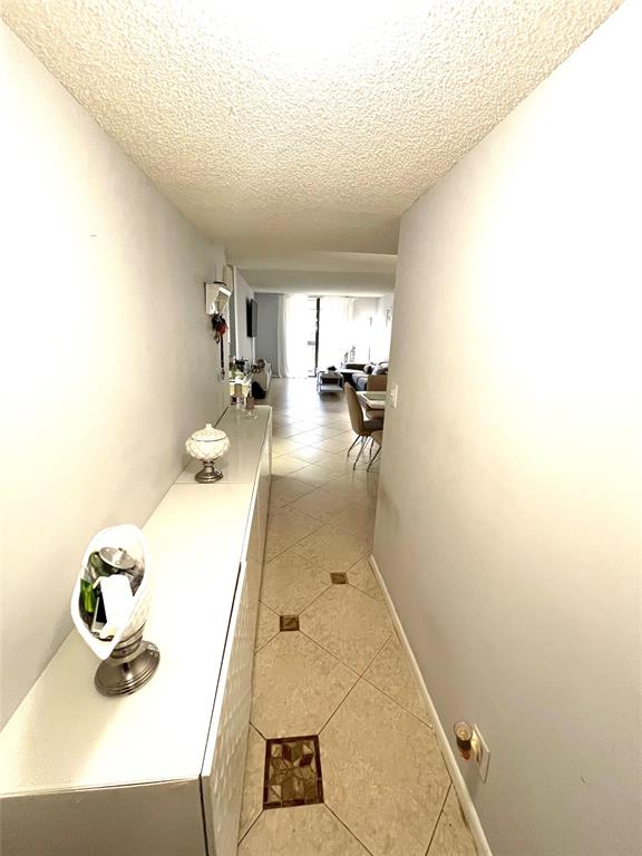 737 Southeast 1st Way, Unit 302 Deerfield Beach, FL 33441 - Photo 3 of 21 a view of kitchen and sink