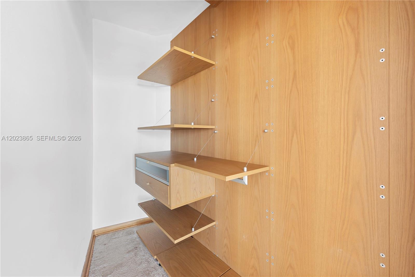 450 Alton Road, Unit 3206 Miami Beach, FL 33139 - Photo 18 of 25 a view of walk in closet