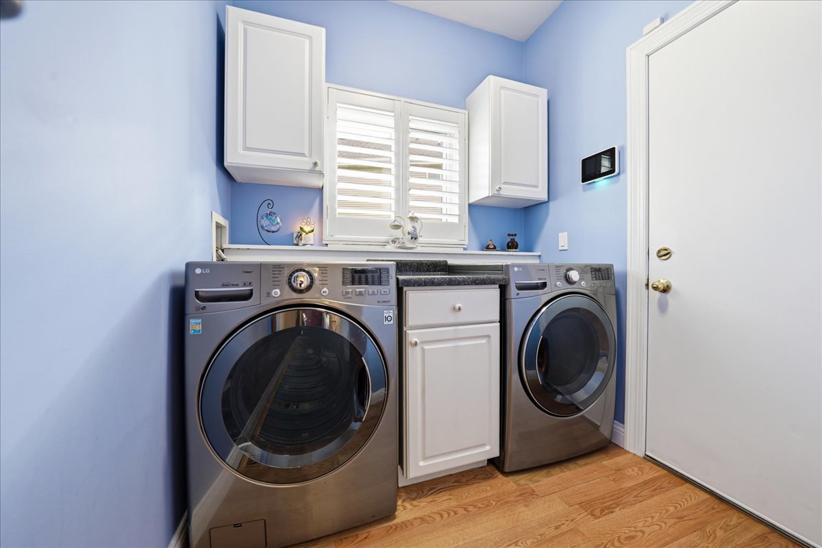334 Clearview Circle Round Lake, IL 60073 - Photo 12 of 36 a utility room with sink dryer and washer