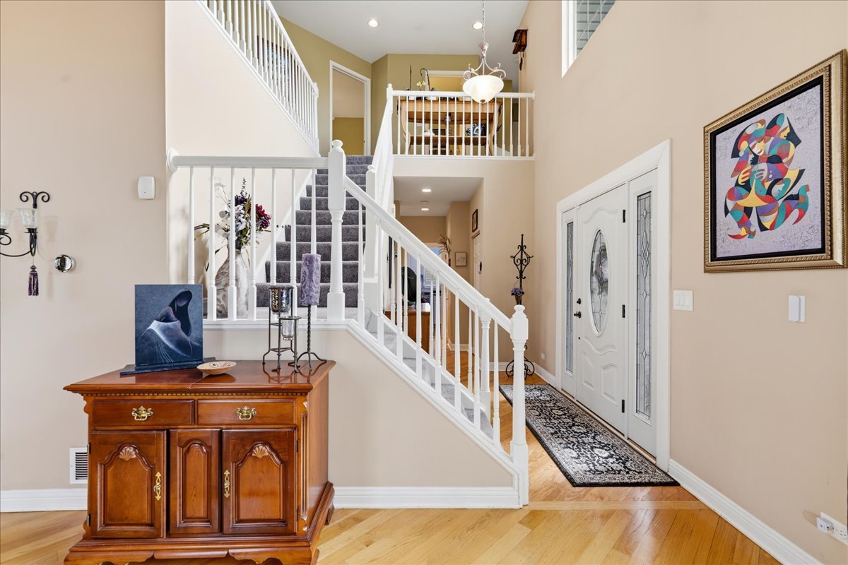 334 Clearview Circle Round Lake, IL 60073 - Photo 2 of 36 a view of an entryway with wooden floor