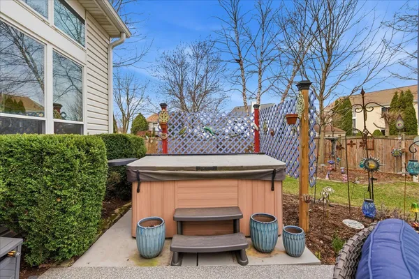a view of a backyard with a garden and plants