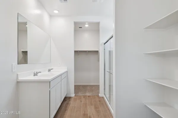 a view of a room and a bathroom