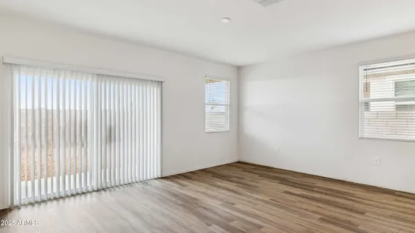 a kitchen with stainless steel appliances a refrigerator sink and cabinets