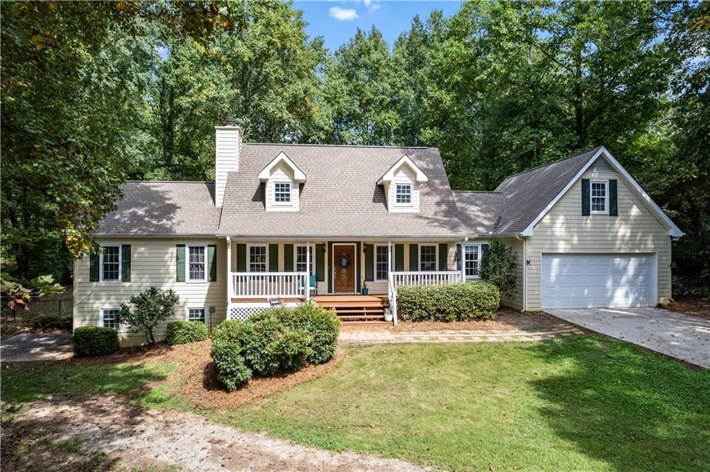 5734 Garden Walk Flowery Branch, GA 30542 - Photo 1 of 1 front view of a house with a yard