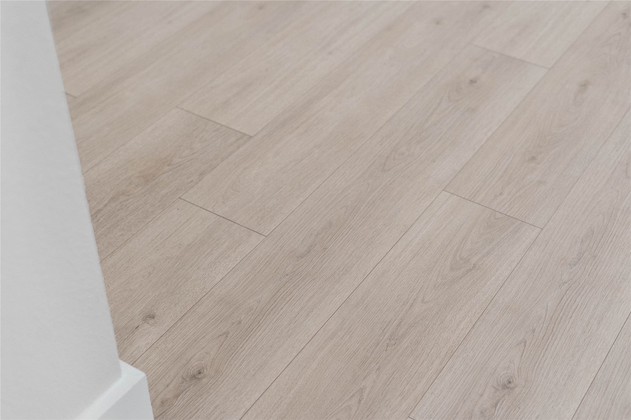 2035 Frst Strm Way Conroe, TX 77304 - Photo 10 of 45 RevWood Laminate flooring in color Bleached Linen.