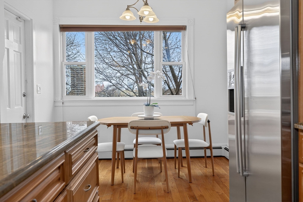 60 Iffley Road, Unit 2 Boston, MA 02130 - Photo 11 of 26 a view of a hallway with furniture and window