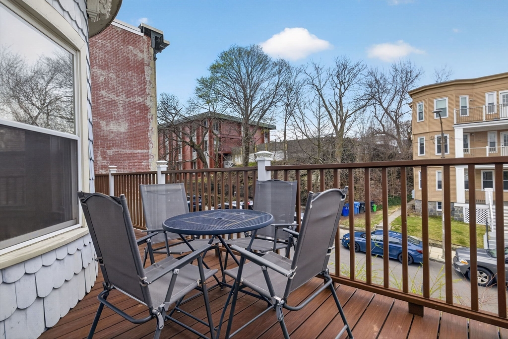 60 Iffley Road, Unit 2 Boston, MA 02130 - Photo 17 of 26 a view of a chairs and table in patio