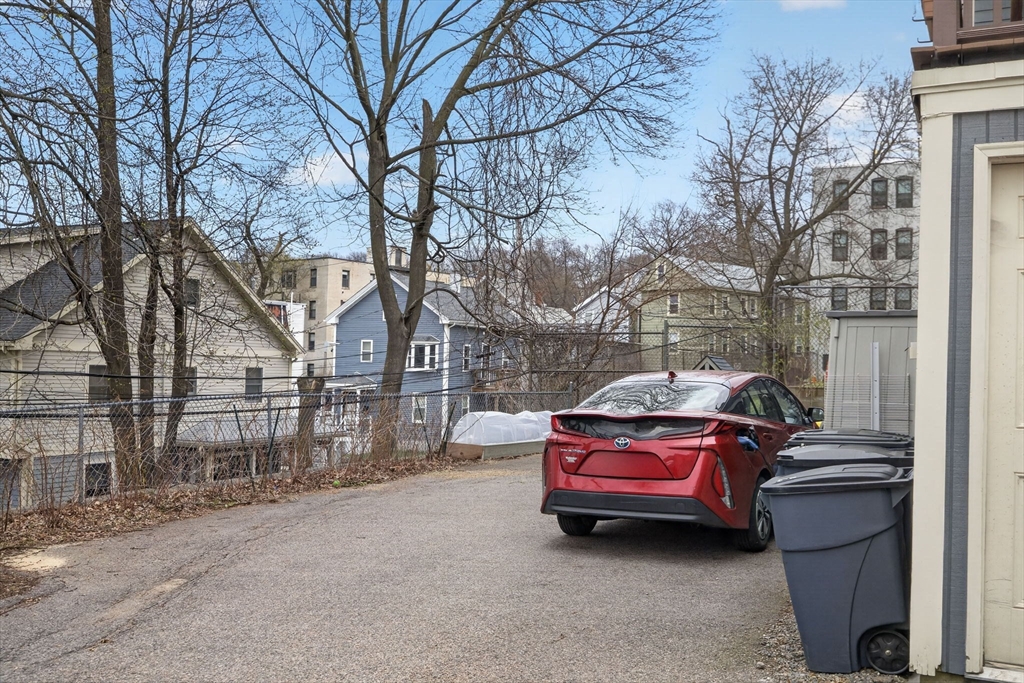 60 Iffley Road, Unit 2 Boston, MA 02130 - Photo 19 of 26 a car parked in front of a house